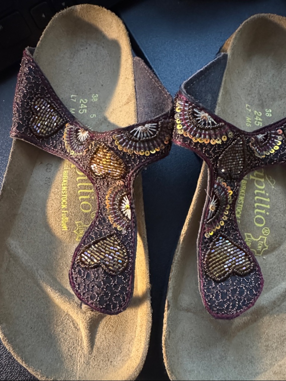 Birkenstock Embellished Thong Sandals in Dark Brown with Gold Accents